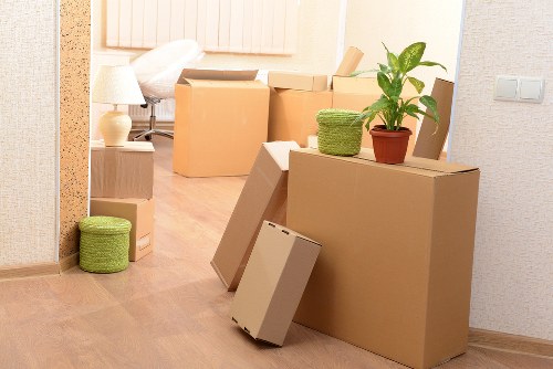 Moving van prepared for house removals in Thehyde with furniture loading
